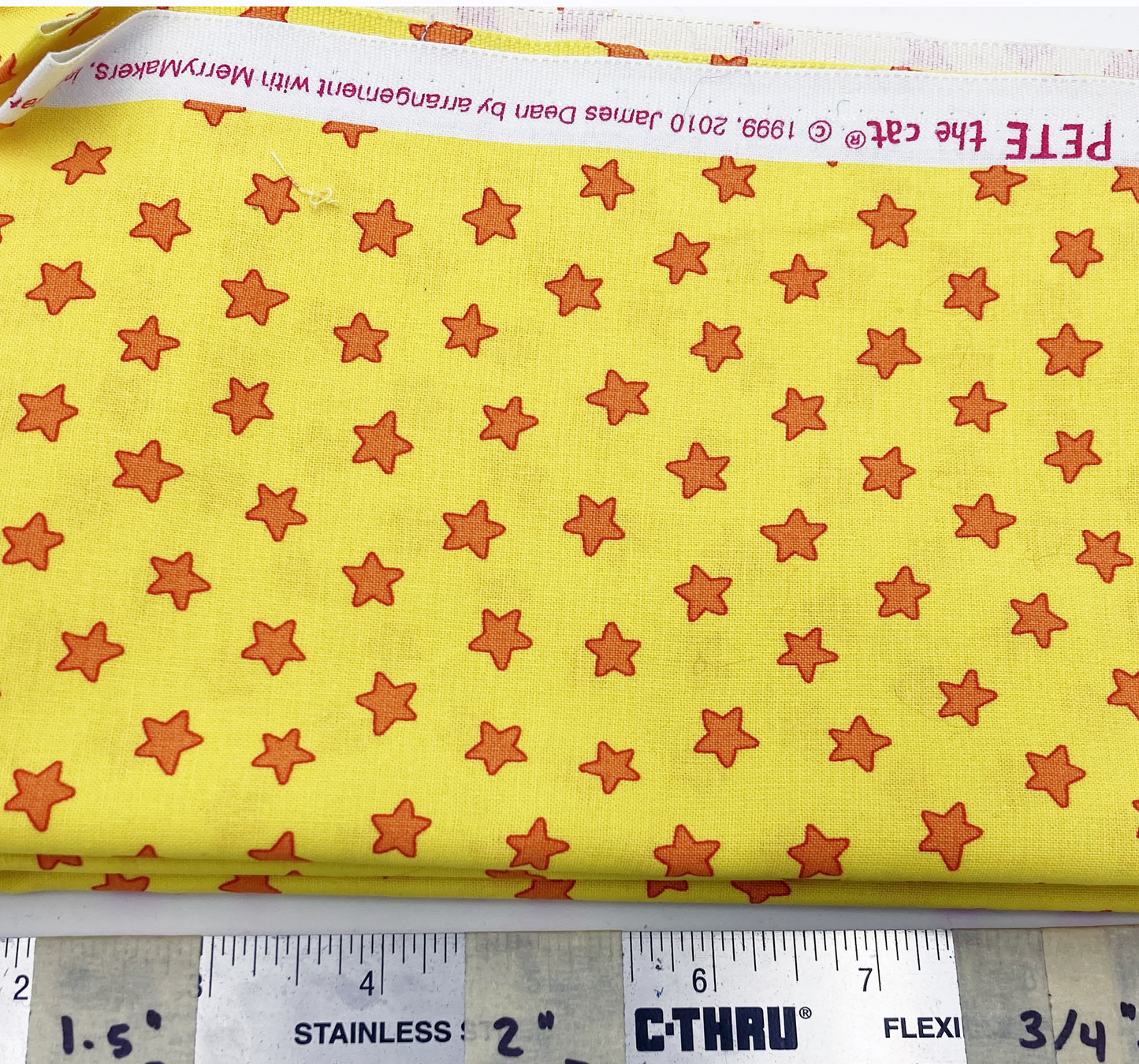 Small red stars on yellow