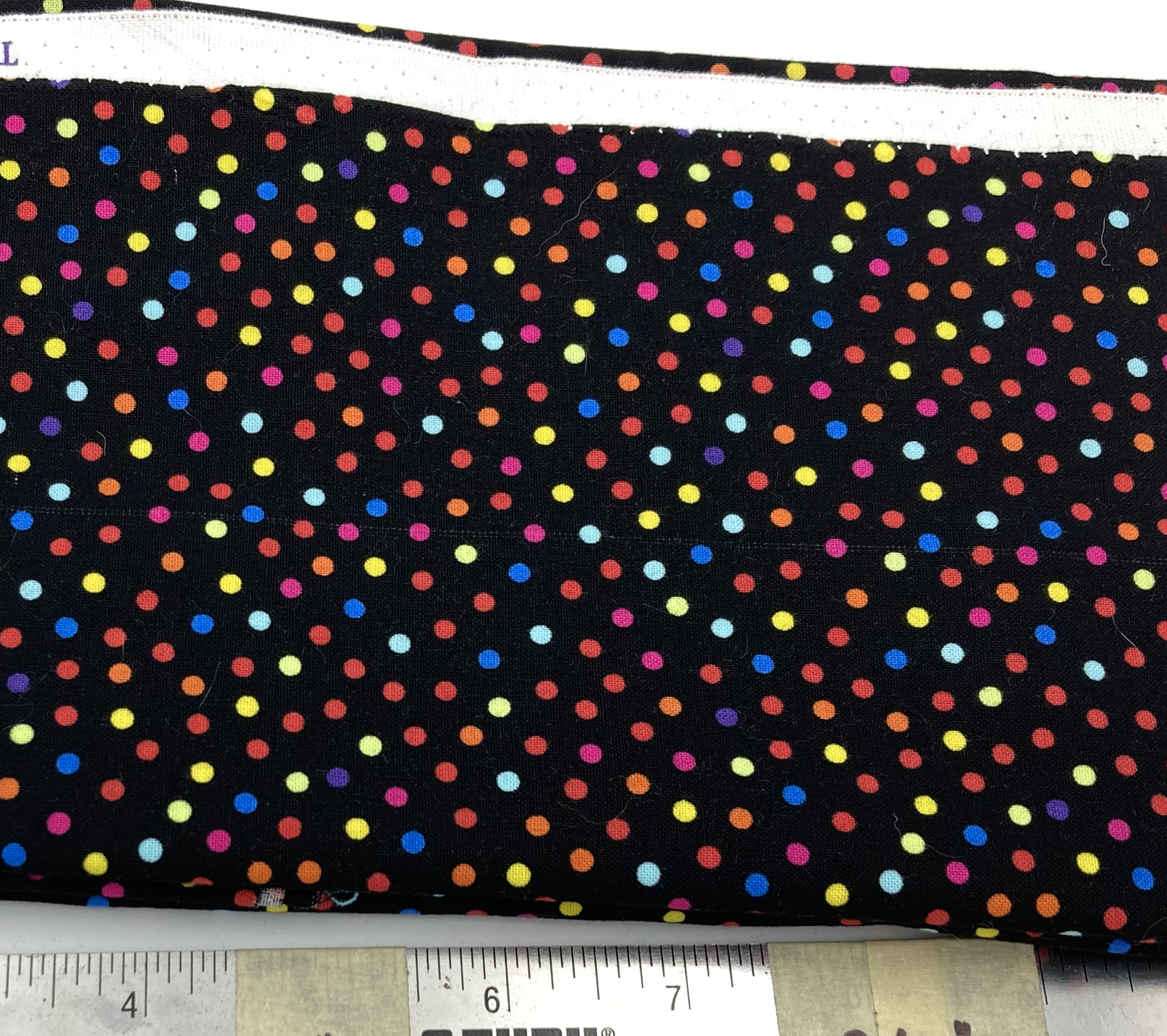 Rainbow dots on black