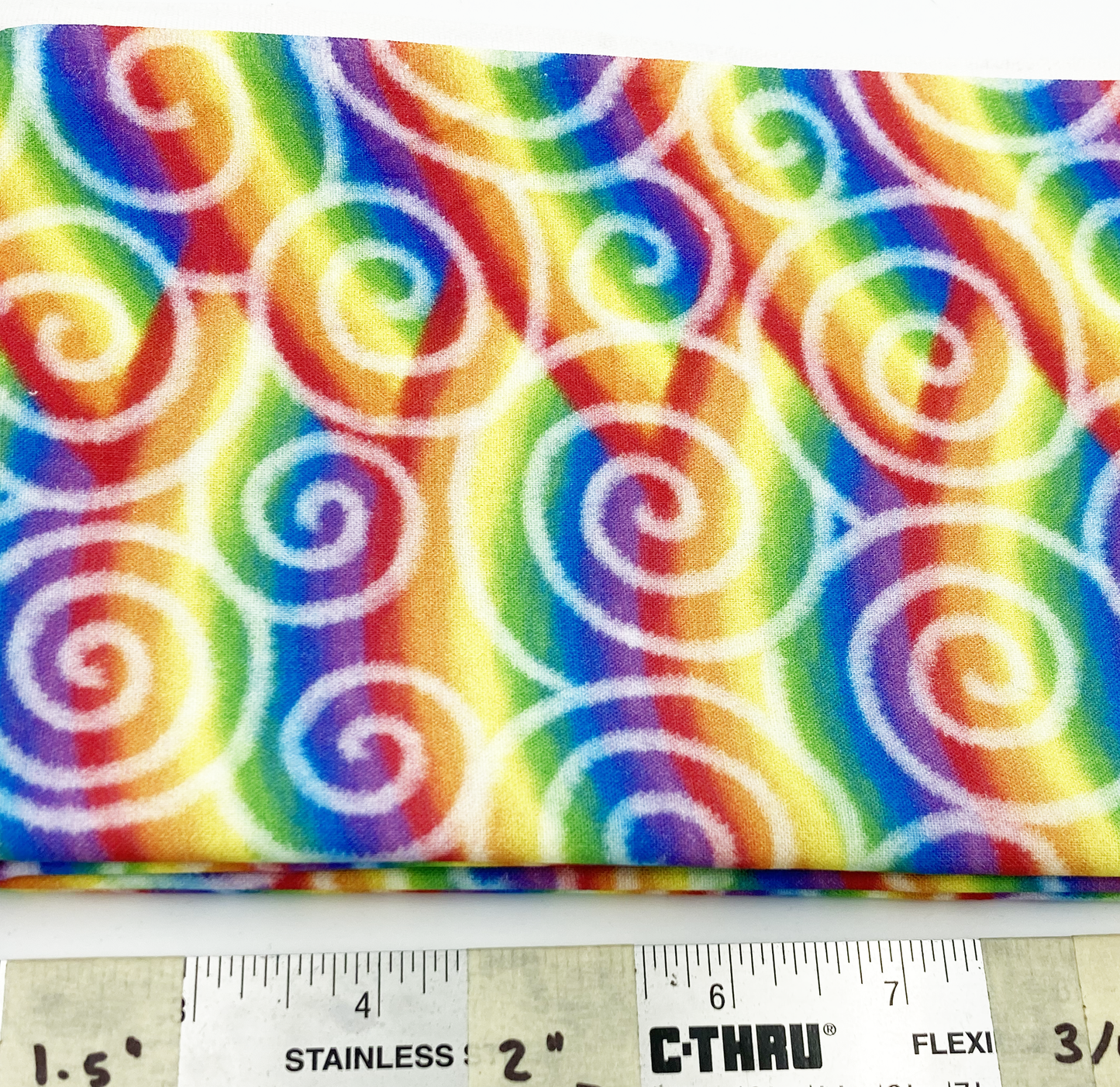 Rainbow with white swirls